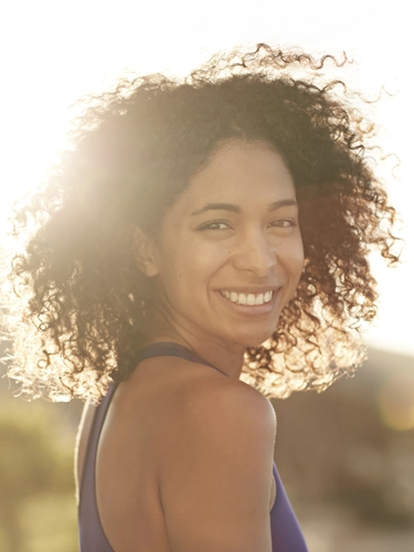 Integrated Health Care Clinic Calgary AB Smiling Woman In The Sun